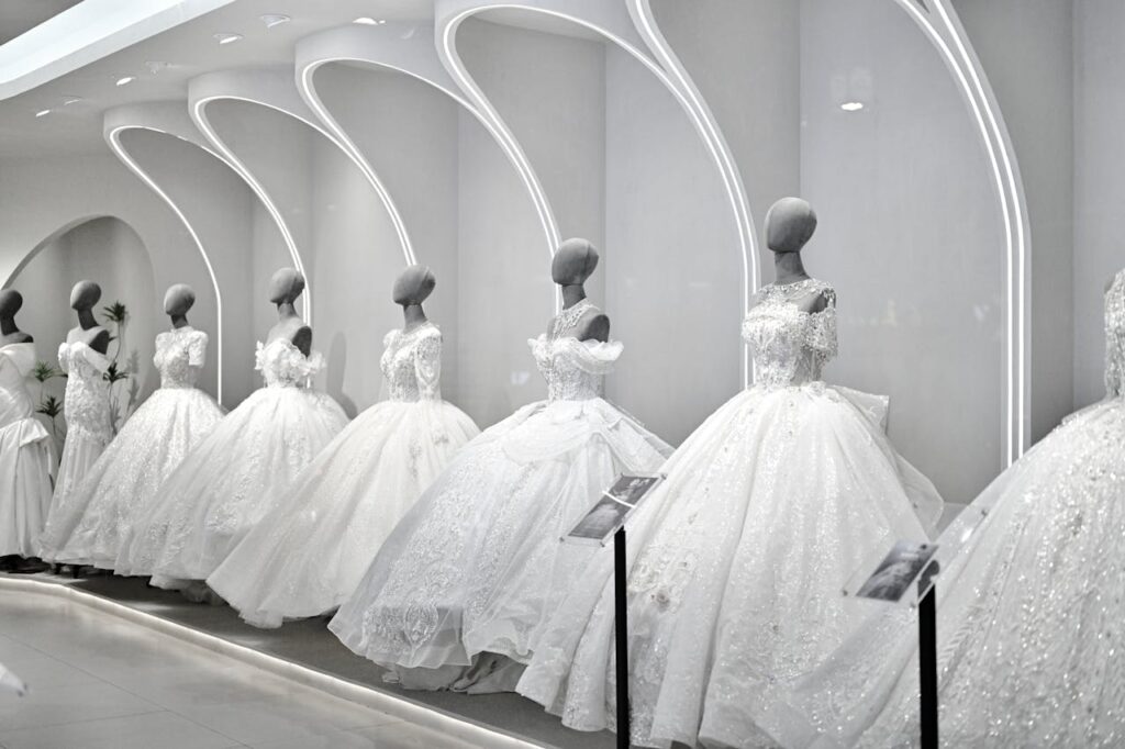 A showcase of beautiful wedding dresses in a modern boutique in Suzhou, China.