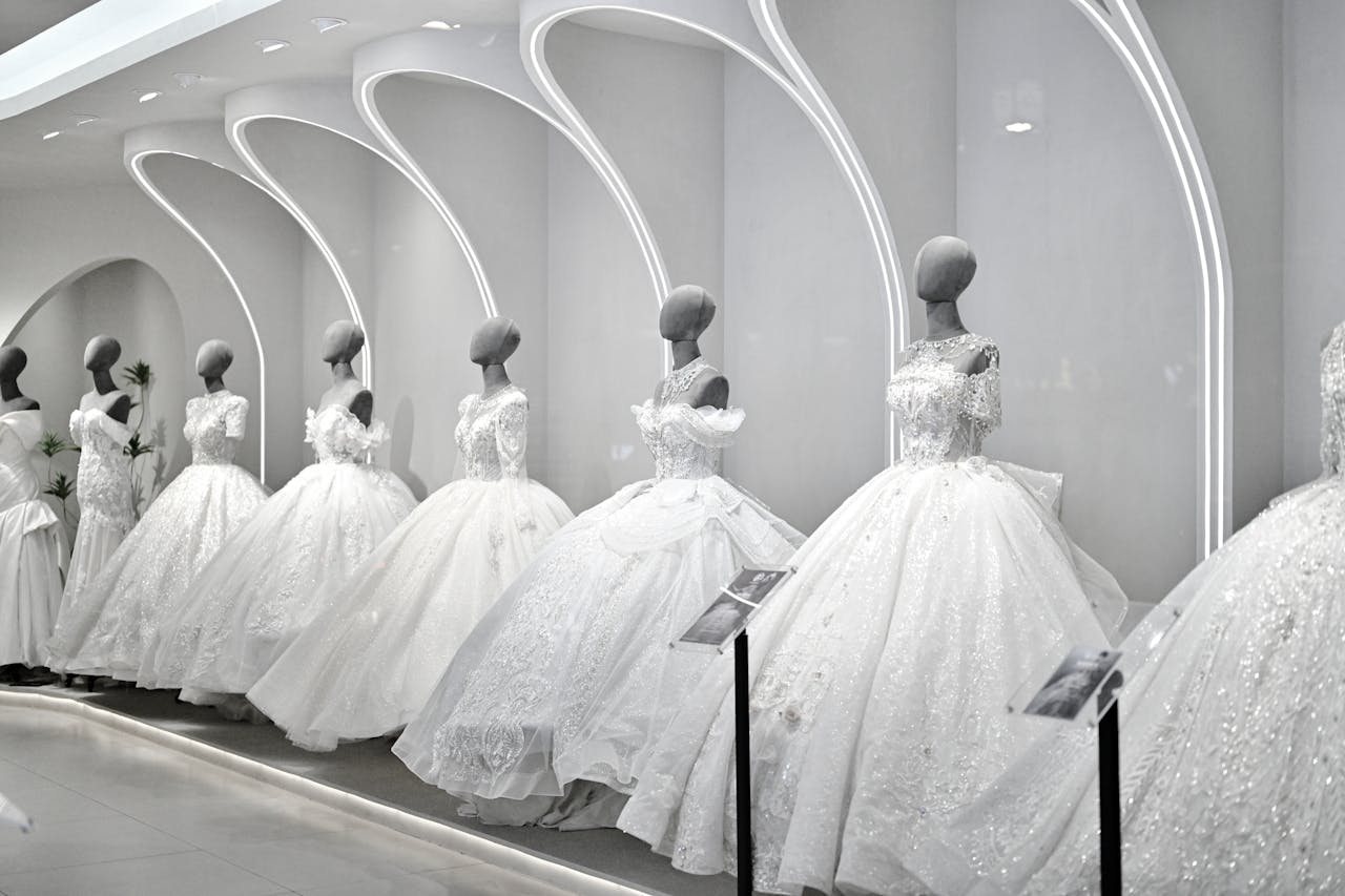 A showcase of beautiful wedding dresses in a modern boutique in Suzhou, China.