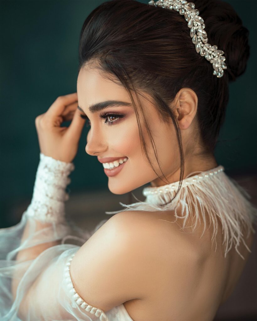 Beautiful bridal portrait showcasing elegance and chic style with stunning makeup and accessories.